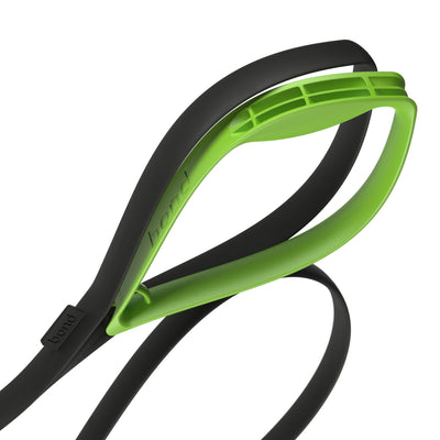 Green ergonomic grip being attached to dog leash